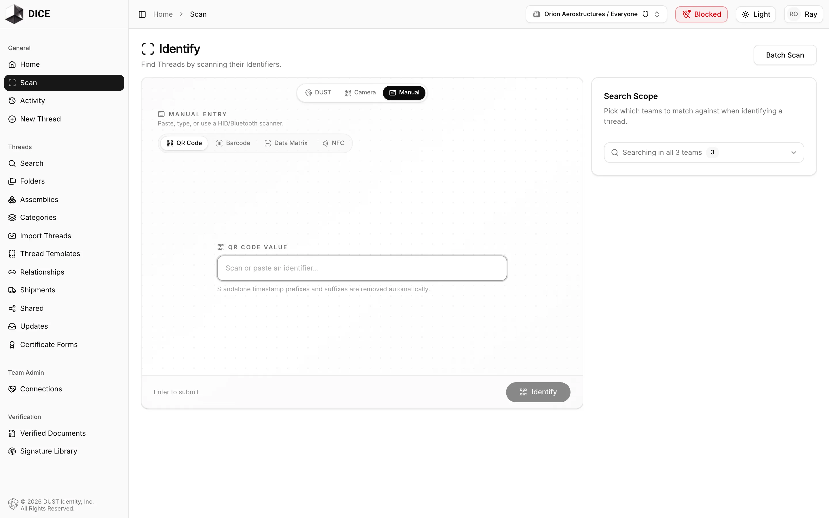 The Identify page on the Scan screen, with DUST, Camera, and Manual modes and a team scan scope